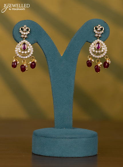 Necklace with multicolour & cz stones and pearl & maroon beads hangings in victorian finish