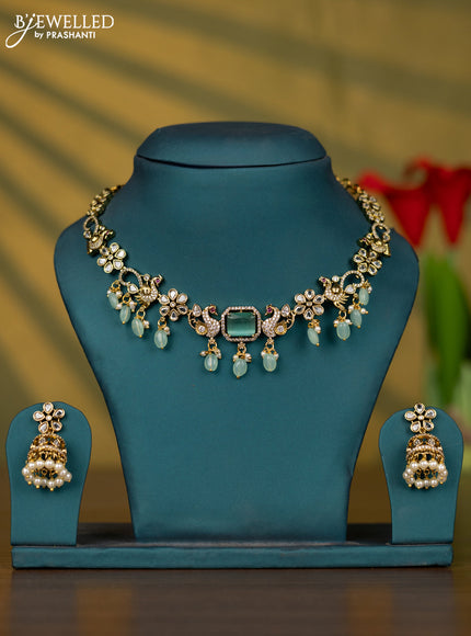 Necklace peacock design with mint green & kundan cz stones and beads hangings in victorian finish