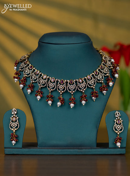 Necklace with ruby & cz stones and pearl & beads hangings in victorian finish