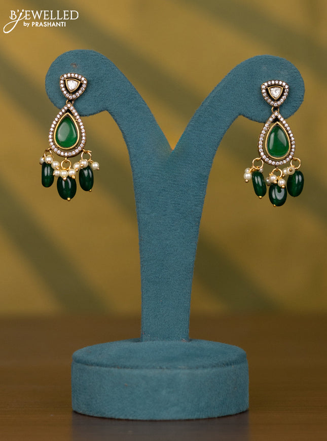 Necklace with emerald & kundan cz stones and pearl & green beads hangings in victorian finish