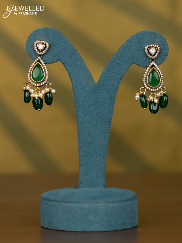 Necklace with emerald & kundan cz stones and pearl & green beads hangings in victorian finish