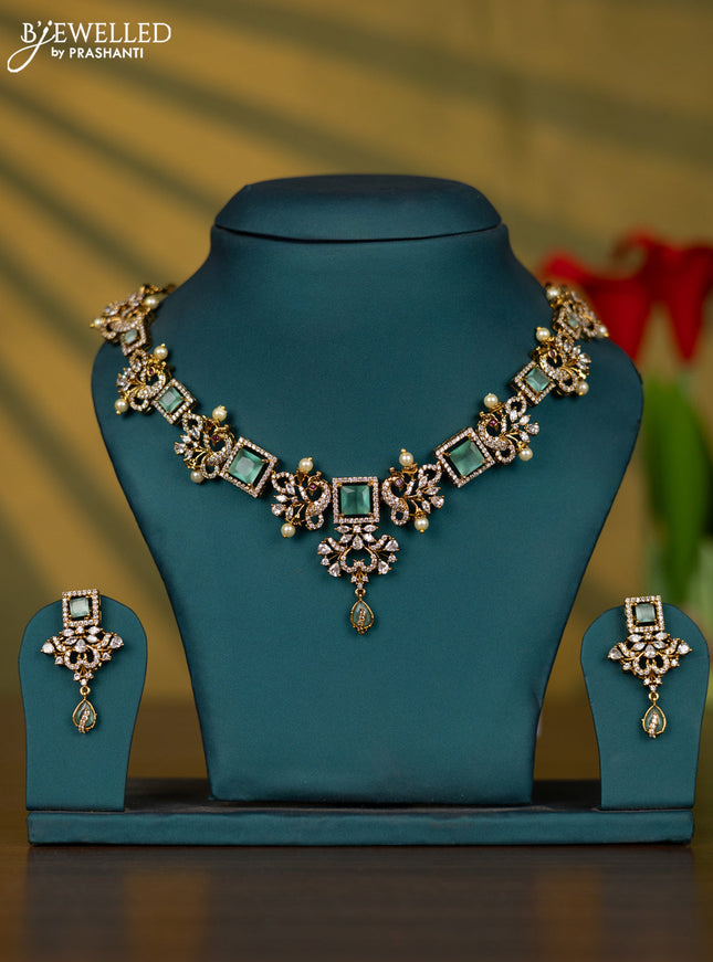 Necklace with mint green & cz stones and pearl in victorian finish