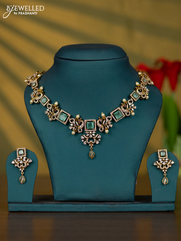 Necklace with mint green & cz stones and pearl in victorian finish