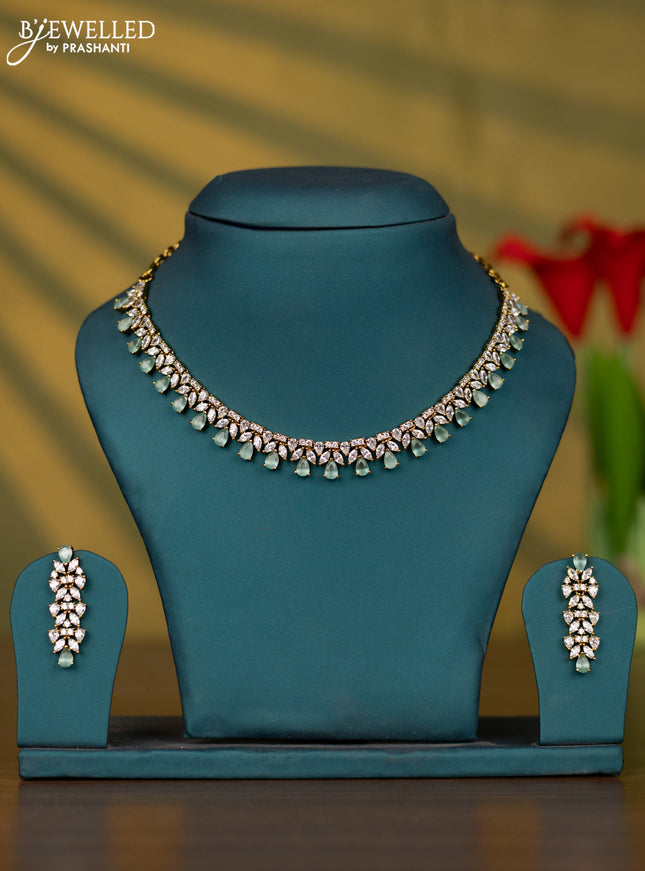Necklace with mint green and cz stones and pearl in victorian finish
