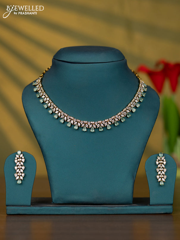 Necklace with mint green and cz stones and pearl in victorian finish
