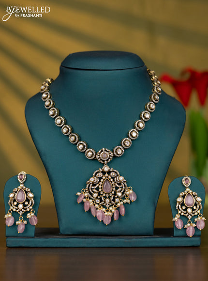 Necklace with baby pink & kundan cz stones and pearl & baby pink beads hangings in victorian finish