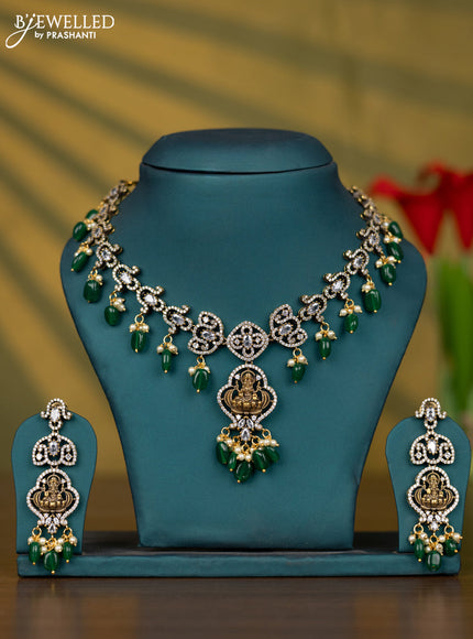 Necklace lakshmi design with cz stones and pearl & green beads hangings in victorian finish