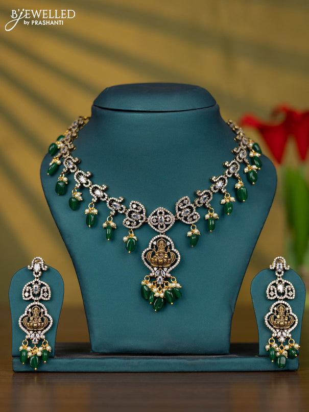 Necklace lakshmi design with cz stones and pearl & green beads hangings in victorian finish