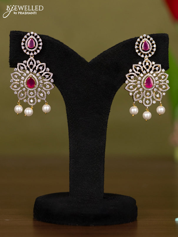 Zircon necklace with ruby & cz stones and pearl hangings in gold finish