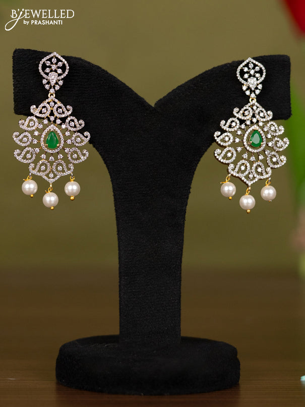 Zircon necklace with emerald & cz stones and pearl hangings in gold finish