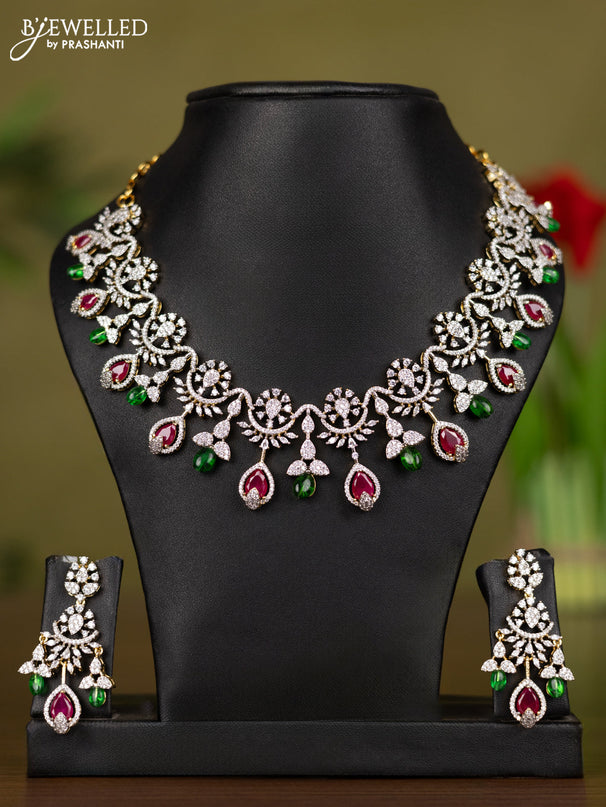 Zircon necklace with ruby & cz stones and green beads in gold finish