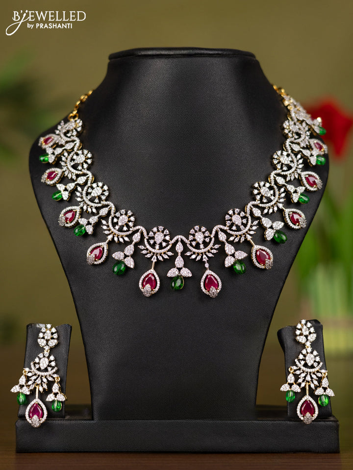 Zircon necklace with ruby & cz stones and green beads in gold finish
