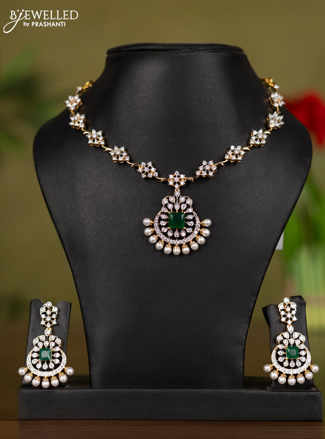 Zircon necklace with emerald & cz stones and pearls in gold finish