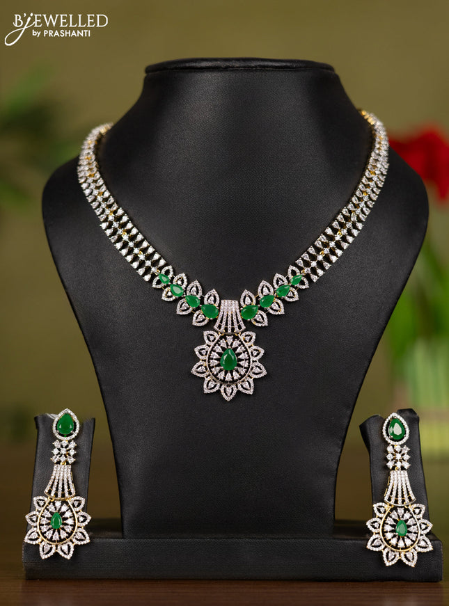 Zircon necklace with emerald and cz stones in gold finish