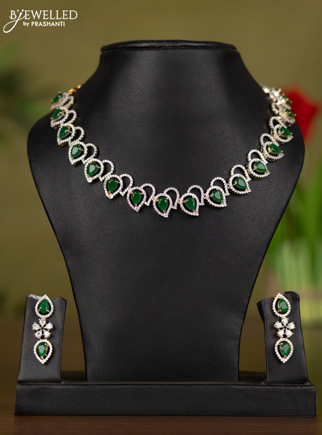 Zircon necklace with emerald and cz stones in gold finish