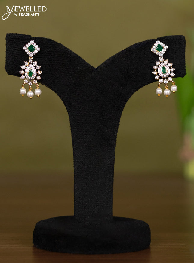 Zircon necklace with emerald & cz stones and pearl hangings in gold finish