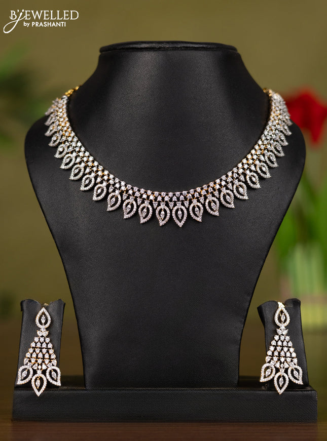 Zircon necklace manga pattern with cz stones in gold finish