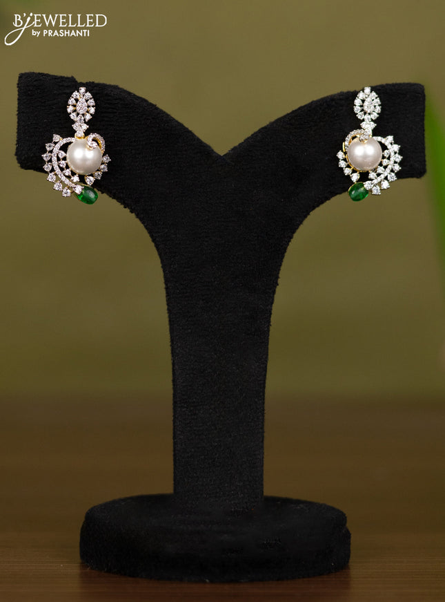 Zircon necklace with cz stones and pearl & green beads in gold finish