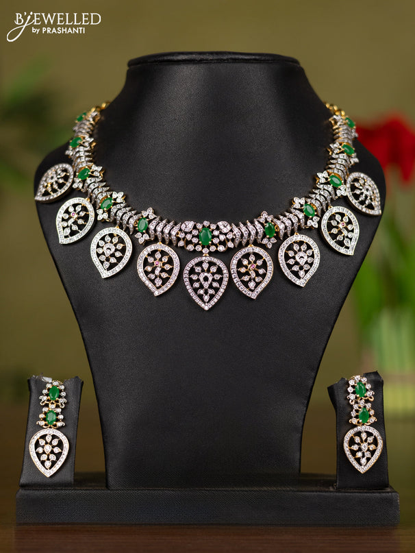 Zircon necklace manga pattern with emerald and cz stones in gold finish