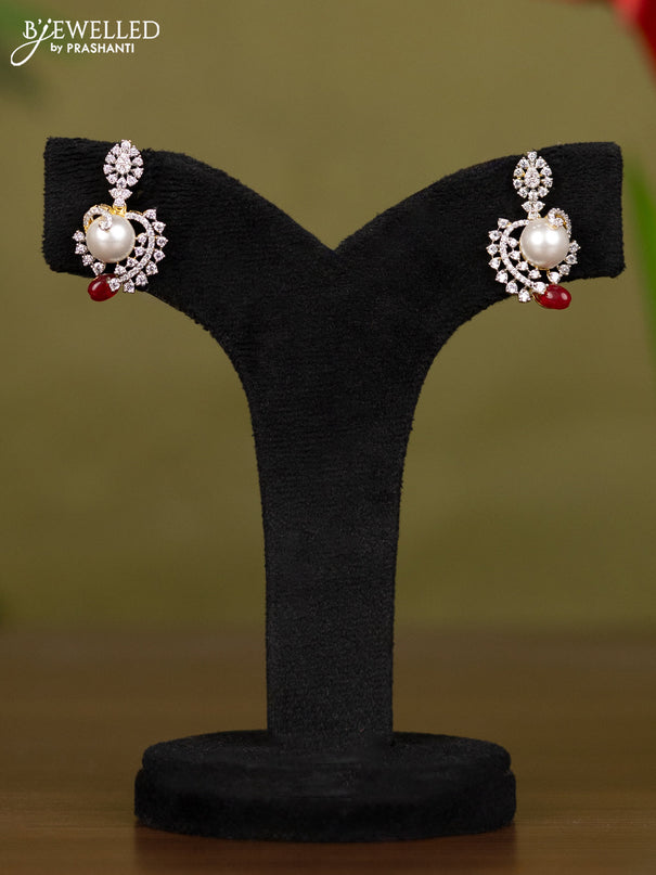 Zircon necklace with cz stones and pearl & pink beads in gold finish