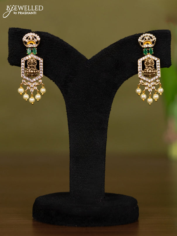Zircon necklace lakshmi design with emerald & cz stones and pearl hangings in gold finish