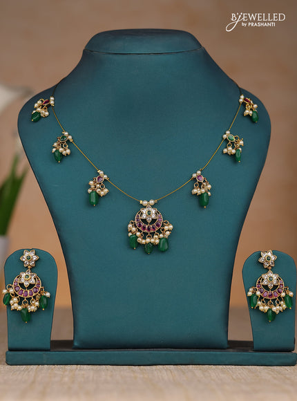 Inivisible chain chandbali design in kemp stones and green & pearl hangings
