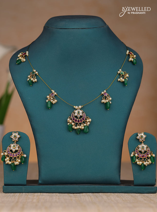 Inivisible chain chandbali design in kemp stones and green & pearl hangings