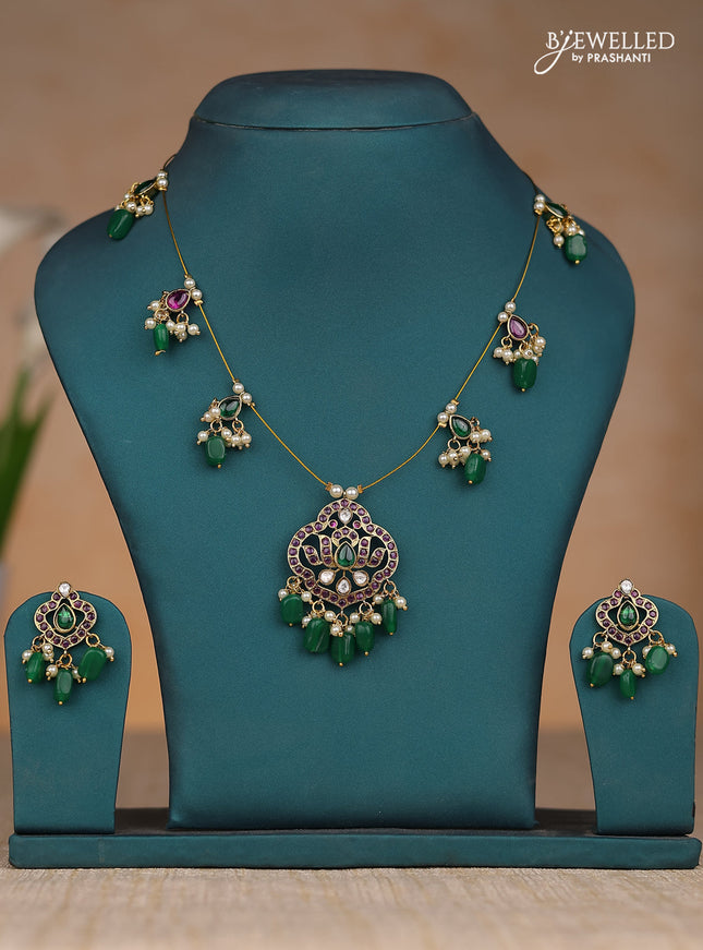 Inivisible chain lotus design in kemp stones and green & pearl hangings