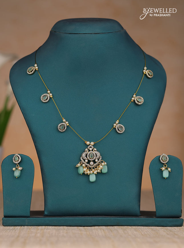 Inivisible chain double peacock design in blue stone in victorian finish