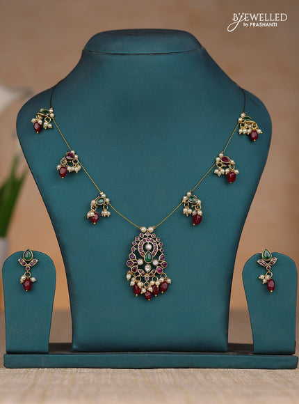 Inivisible chain in kemp stones and red & pearl hangings