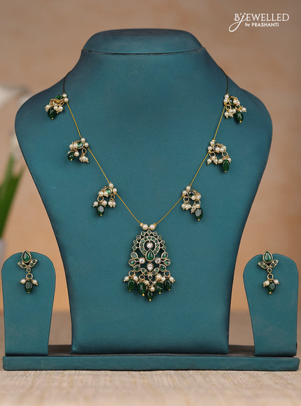 Inivisible chain in green kemp stones and red & pearl hangings