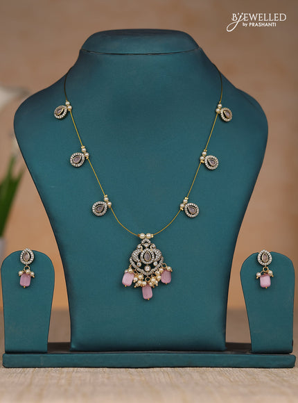 Inivisible chain double peacock design in pastel pink stones and beads