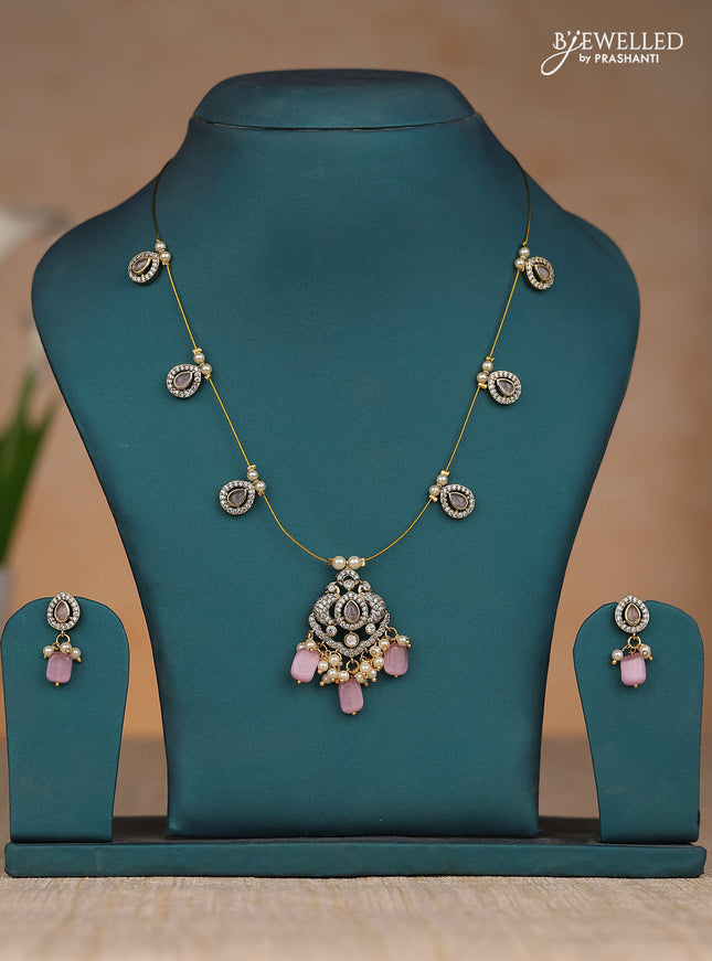 Inivisible chain double peacock design in pastel pink stones and beads