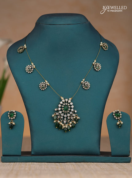 Invisible chain with dark green stones and beads victorian finish