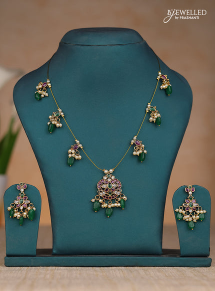 Inivisible chain floral design in kemp stones and green & pearl hangings