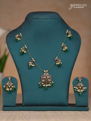 Inivisible chain floral design in kemp stones and green & pearl hangings
