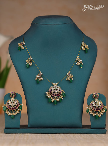 Inivisible chain chandbali design in kemp stones and green & pearl hangings