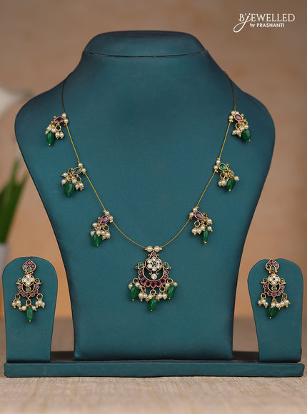 Inivisible chain floral design in kemp stones and green & pearl hangings
