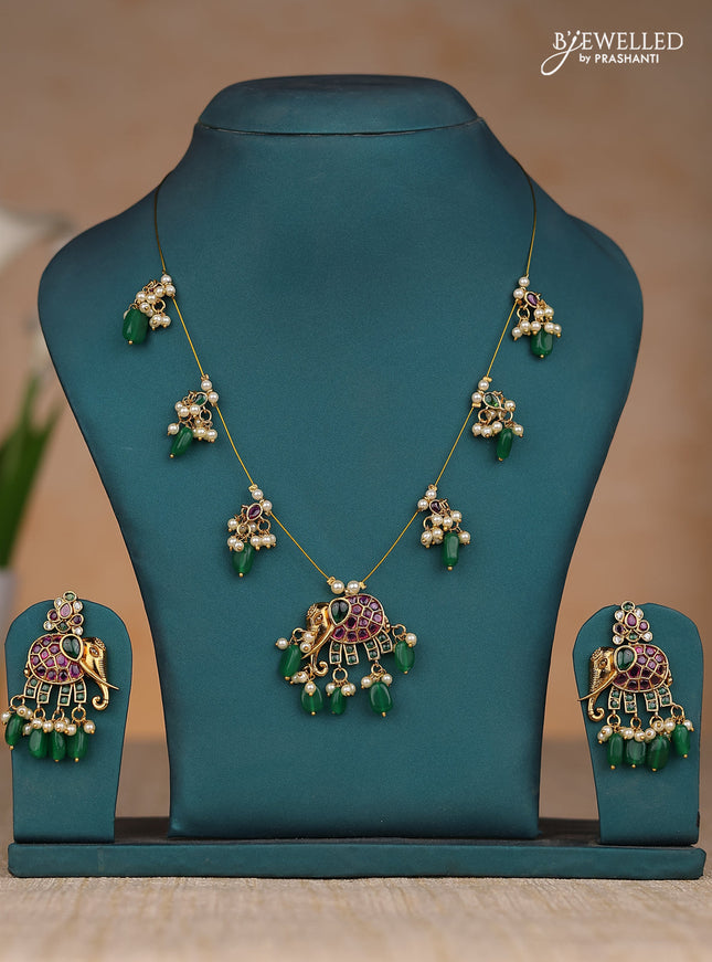 Inivisible chain elephant design in kemp stones and green & pearl hangings
