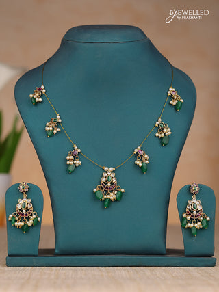 Inivisible chain chandbali floral design in kemp stones and green & pearl hangings