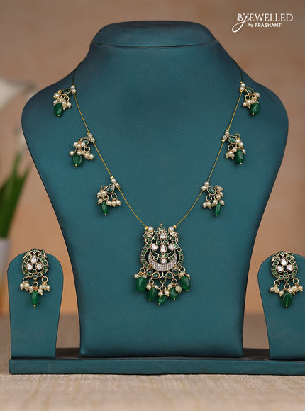 Inivisible chain double peacock design in green kemp stones and green & pearl hangings
