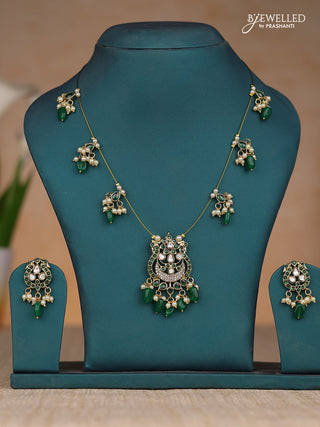 Inivisible chain double peacock design in green kemp stones and green & pearl hangings