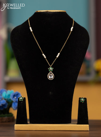Antique chain with floral pendant in green stones & victorian finish
