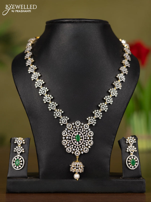 Zircon necklace with emerald & cz stones and pearl hanging in gold finish