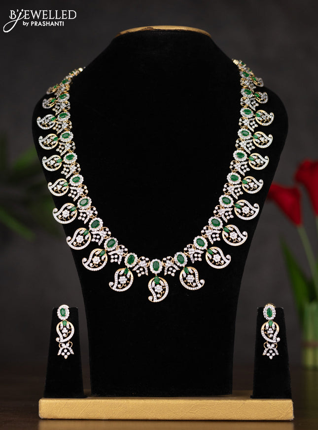 Zircon haaram with manga design in white and green stones