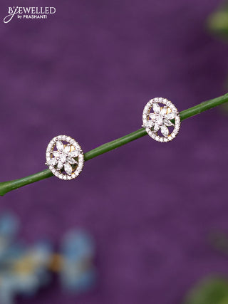 Zircon earrings with cz stones in gold finish