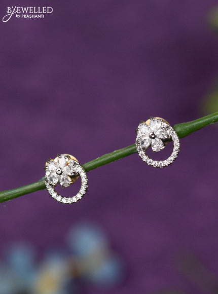 Zircon earrings floral design with cz stones in gold finish
