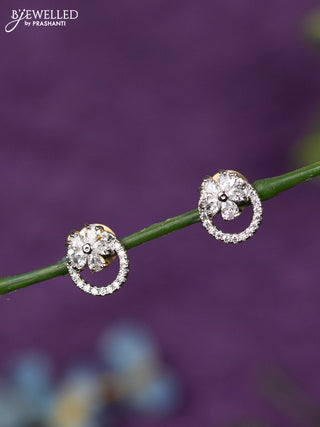 Zircon earrings floral design with cz stones in gold finish