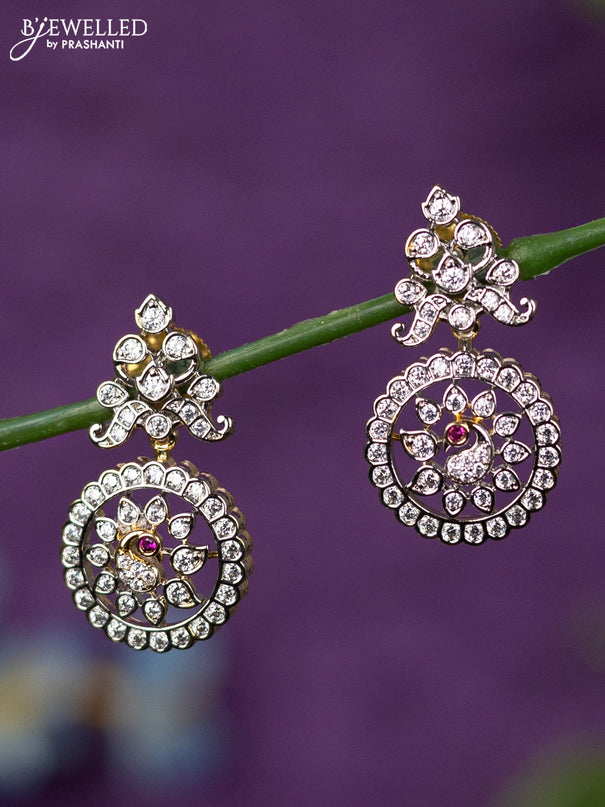 Zircon earrings with cz stones in gold finish
