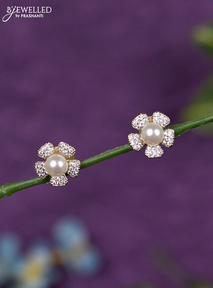 Zircon earrings floral design with cz stones and pearl in gold finish